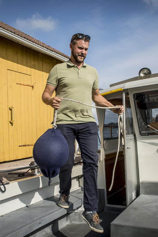 Mickel Nyström on a boat